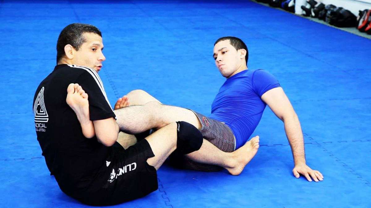 How to Do a Straight Ankle Lock in MMA Fighting Howcast