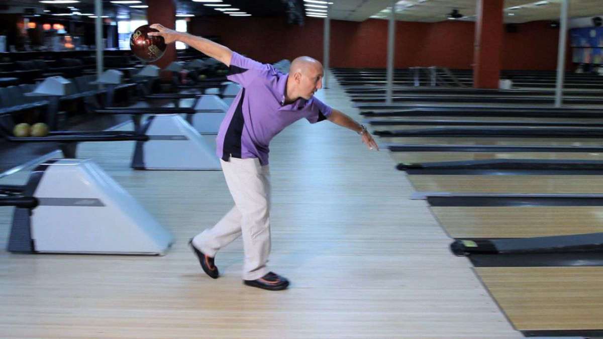 How to Improve Your Bowling Approach Howcast
