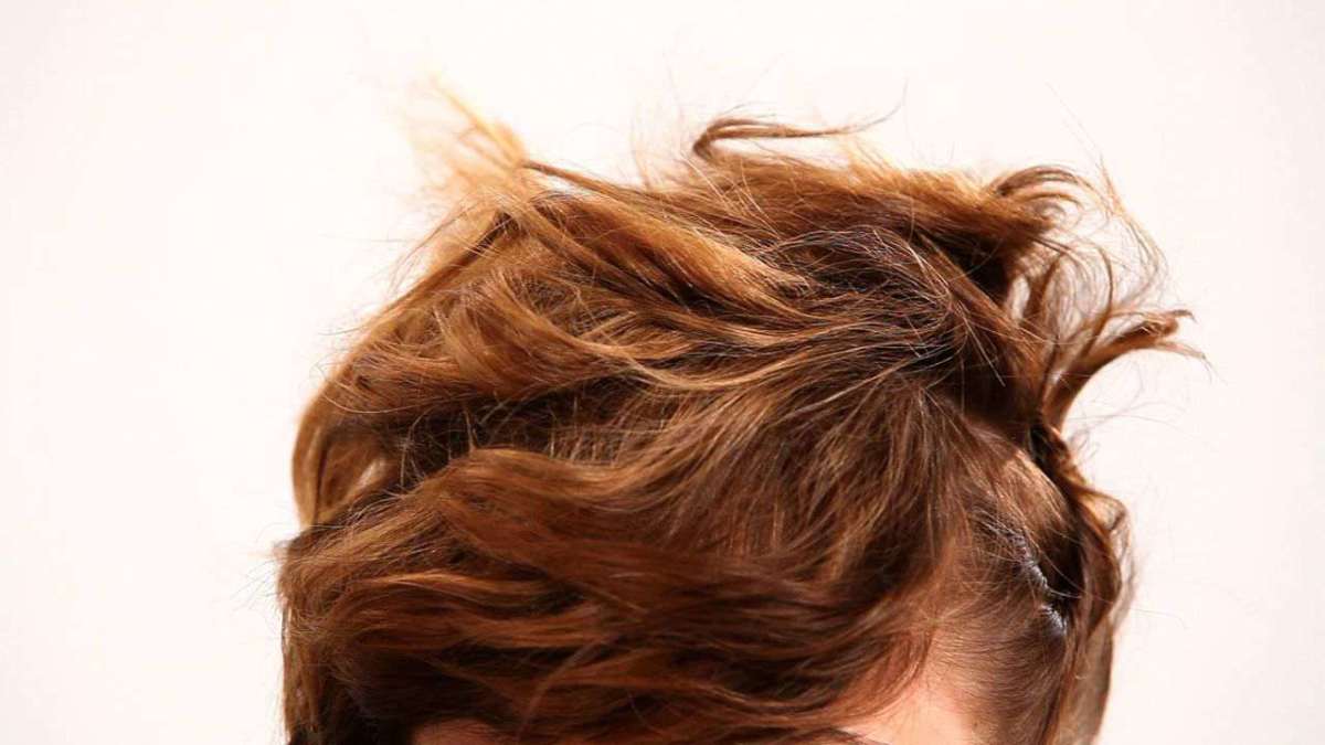 How To Pin Hair For A Messy Updo Howcast