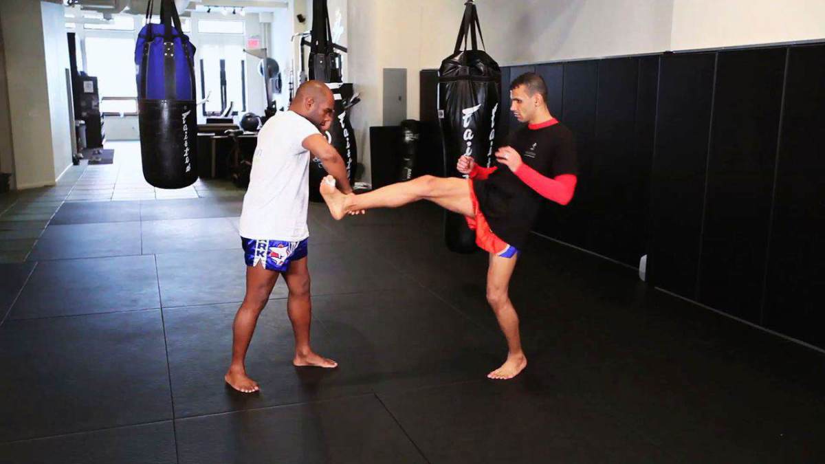 How to Defend against the Push Kick in Muay Thai Kickboxing Howcast