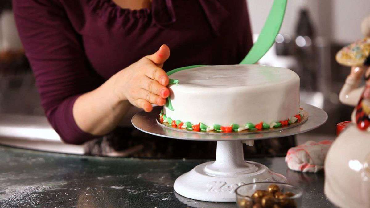 How To Attach Decorations To A Christmas Cake Howcast