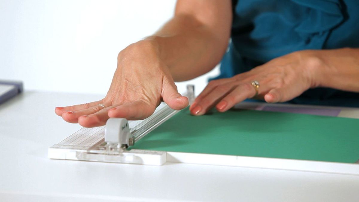 How to Use a Paper Trimmer for Scrapbooking Howcast