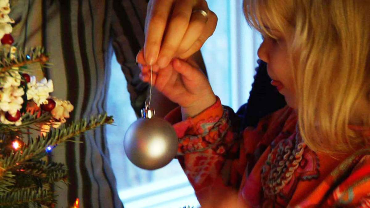 How to Hang Ornaments on a Christmas Tree Howcast