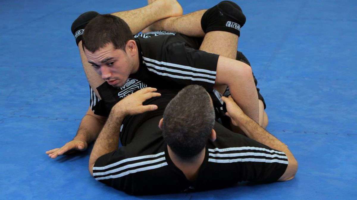 How to Do an Inverted Arm Lock from a Triangle Hold Howcast