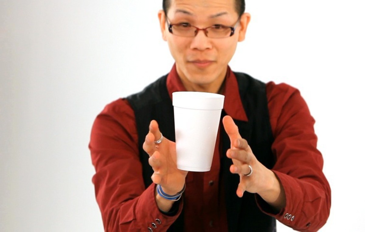 How to Do the Floating Coffee Cup Office Magic Trick Howcast