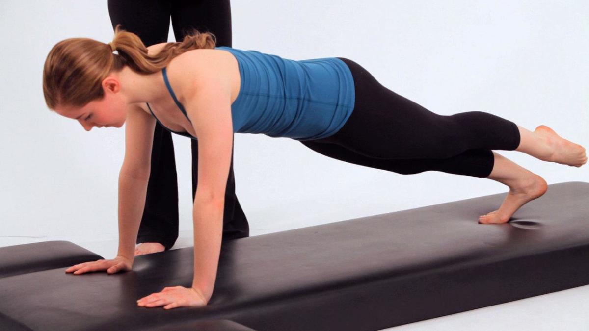 How to Do the Leg Pull-Down in Pilates - Howcast