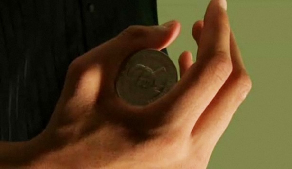 How to Do the Coin Palm Magic Trick Howcast