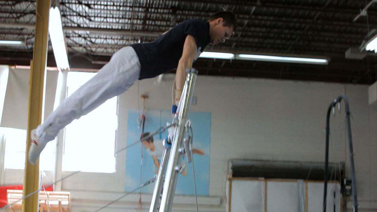 How to Do an Uneven Bars Routine Howcast