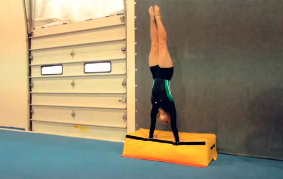How to Do a Round Off Handspring Drill in Gymnastics Howcast