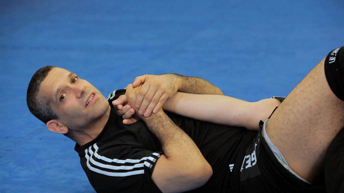 How to Do an Arm Bar from Back Control MMA Submission Howcast